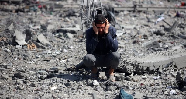 Palestinians try to salvage some items in the devastated yard of a school in the al-Tuffah neighbourhood of Gaza City, on April 4, 2025, a day after it is hit by an Israeli strike. Gaza's civil defence agency says on April 3 that at least 31 people, including children, are killed in the Israeli strike on the school serving as a shelter for Palestinians displaced by the war. (Photo by Majdi Fathi/NurPhoto)NO USE FRANCE